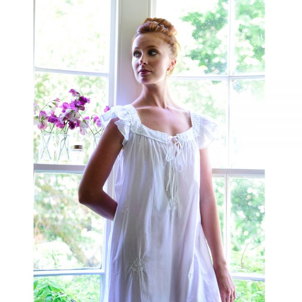 Best Menopause Nightwear UK. Cotton is natural and breathable, fabulous to wick away that moisture for those hot flushes and on hot summer nights. This adorable supremely fine 100% cotton nightdress with frilly cap sleeves and white ribbon ties. Decorated with white embroidered roses and pintucks. This is a elegant nightie and would make an ideal attractive gift for someone to wear on those warm nights.
