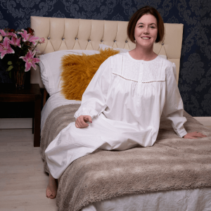 Our long white cotton nighties - Amelia is a graceful round necked, excellent quality fine soft, thicker 100% cotton nightgown. This pleasing nightdress has four opening shell buttons down the front, and long sleeves which are finished off with a single shell button on each cuff.      The embroidery on this lovely nightie is stunning and it would make an ideal 'special' gift. Our long white cotton nighties are also ideal to wear during pregnancy and breastfeeding.