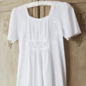 Ladies short sleeve cotton nightwear, Alicia is our 18th Century Jane Austen style cotton nightdress is beautifully feminine, made from 100% cotton. It has been based on the 18th Century style, when ladies during the regency era wore fine white muslin with delicate whitework embroidery on them. Just picture Jane Austen! The design features floral embroidery on the front and back and lace around the neckline with scalloped edged short floaty sleeves. This beautiful  vintage inspired nightdress is full length and very comfortable as there are no tight underarm seams.