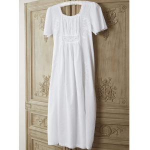 Ladies short sleeved cotton nightwear. Our Alicia is inspired by 18th Century Jane Austen design when ladies during the regency era wore fine white muslin, with delicate whitework embroidery on them. This nightdress features floral embroidery on the front, back, with lace around the neckline. Featuring also scalloped edged short floaty sleeves, with no tight underarm seams.  This beautiful vintage inspired ladies short sleeved cotton nightwear is full length and amazingly comfortable, pretty, and feminine.