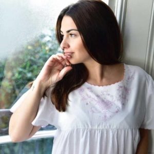 Short Sleeved Nightdress, Mia is a 100% lawn cotton short sleeved nightdress which has a delightful round neckline with impressive lilac embroidery detailing around the yoke and delicate lilac edging on the sleeves.