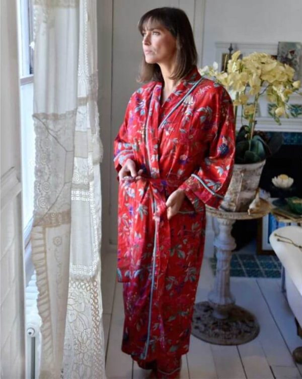 ladies cotton dressing gown, exotic bird design set on a red background, long sleeves and long length, tie waist band and pockets
